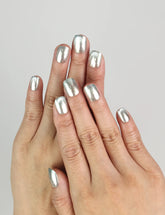 Close-up of Ocean Breeze Singapore press on nails by naillover, cool blue shimmer finish for a trendy summer look.
